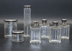 7-teiliges Art Déco Toilettenset / A 7-piece silver and glass Art Deco toilet set, Frankreich, ...