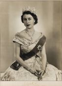 QUEEN ELIZABETH II. A photographed portrait of Queen Elizabeth II, SIGNED "Elizabeth R, 1953."