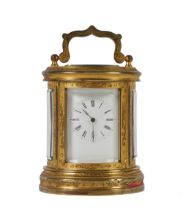 A FRENCH GILT-BRASS MINIATURE CARRIAGE CLOCK