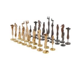 DESIGNED BY PAMELA MAJARO (1932-2016): A GILT AND PATINATED BRONZE FIGURAL CHESS SET (33)