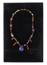 AFTER THE ANTIQUE: A ROMAN STYLE CARNELIAN AND GLASS BEAD NECKLACE