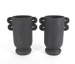 A PAIR OF BLACK CERAMIC VASES