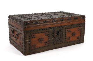 AN INDIAN TEAK AND BRASS STUDDED HARDWOOD PORTABLE STORAGE BOX