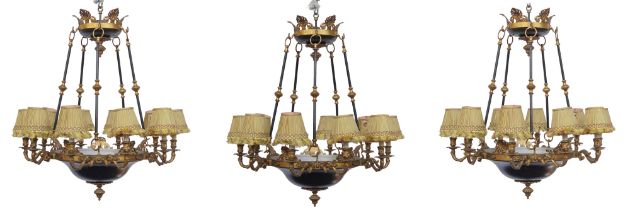 THREE EMPIRE STYLE GILT AND PATINATED METAL TEN LIGHT CHANDELIERS (3)