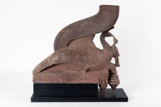 AN INDIAN MUGHAL STYLE SANDSTONE ARCHITECTURAL CORBEL OF A PEACOCK OR WATER BIRD