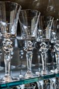SAINT-LOUIS; A SET OF TWENTY FOUR 'EXCESS' PATTERN WINE GLASSES (24)