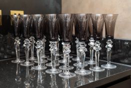 SAINT-LOUIS; A SET OF TWENTY GLASS 'EXCESS' PATTERN CHAMPAGNE FLUTES (20)