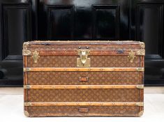 LOUIS VUITTON; AN EARLY 20TH CENTURY RECTANGULAR TRAVELLING TRUNK