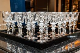 SAINT-LOUIS; A SET OF TWENTY-SIX 'EXCESS' PATTERN WINE GLASSES (26)