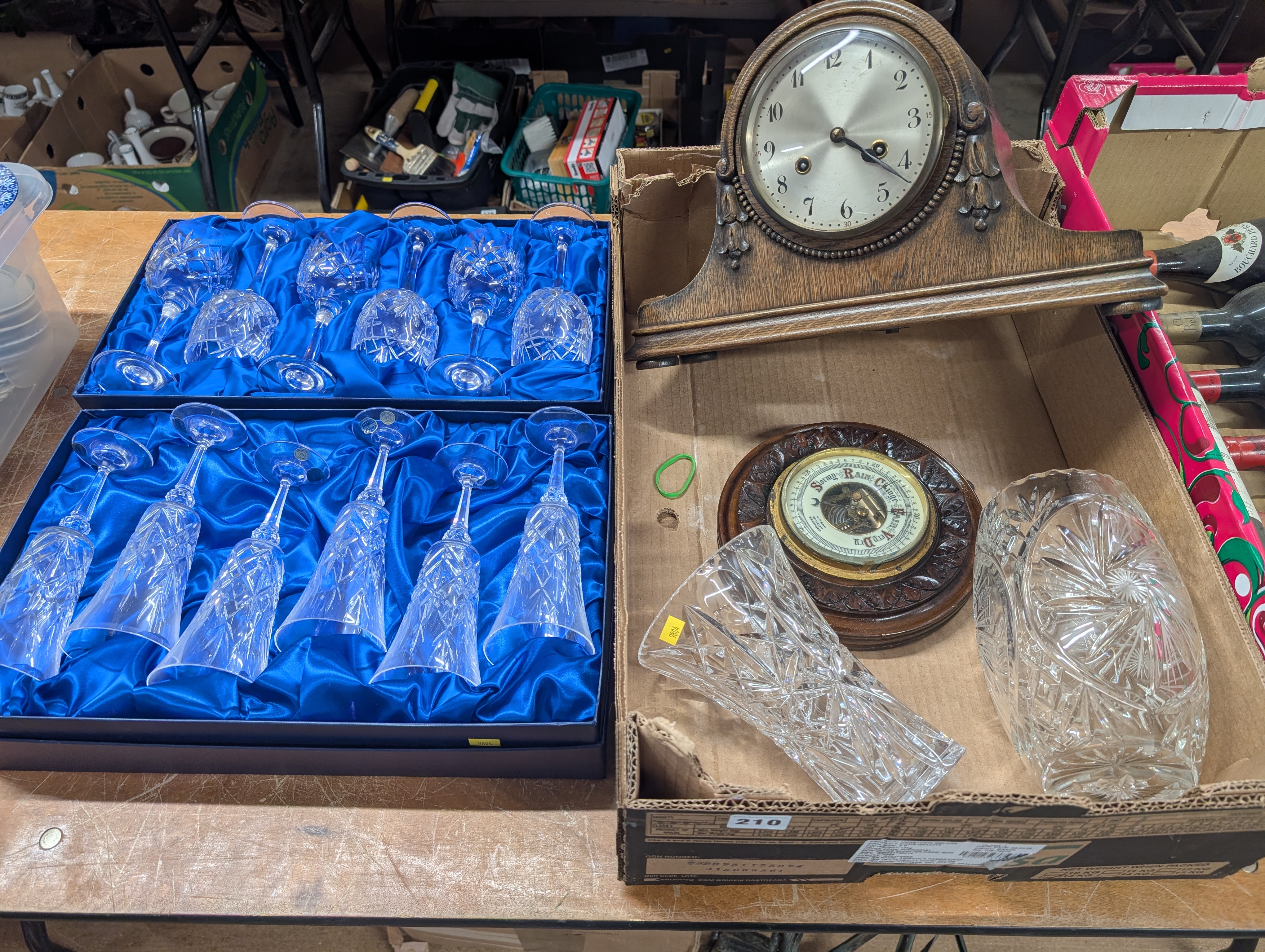 An oak cased mantel clock, barometer, cut glass vases, and two boxes of ...