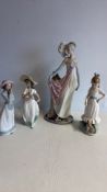 Set of 4 Lladro and NAO Spanish porcelain figurines