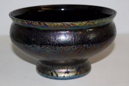 A Royal Brierley iridescent art glass footed bowl, handmade in England, displaying multicoloured