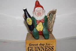 Cast iron Guinness leprechaun on box