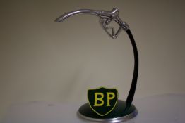Green metal B.P petrol pump handle on base