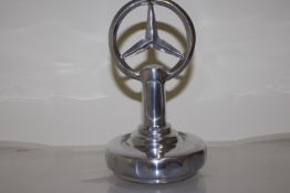 Chrome mercedes car mascot