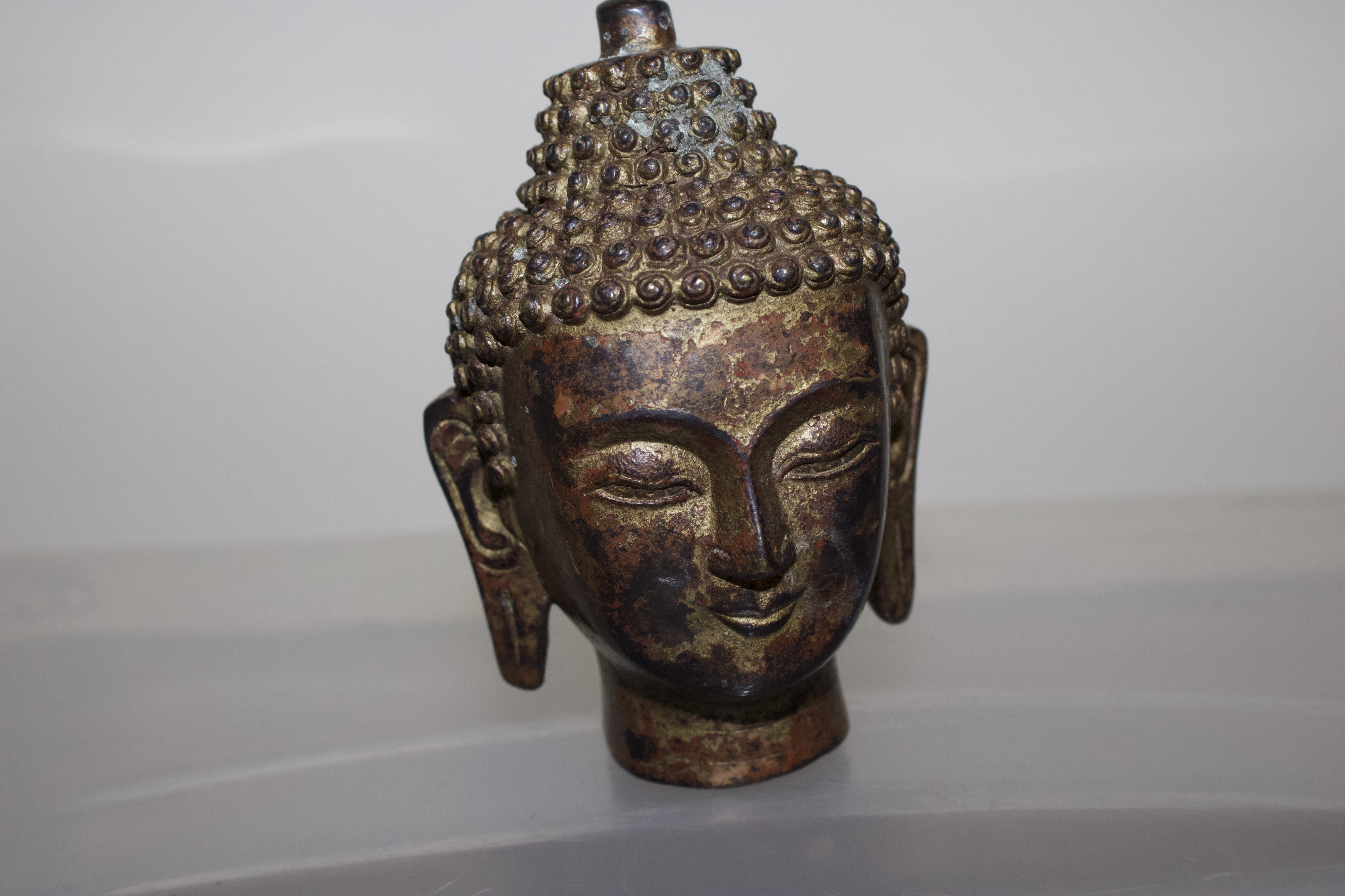 Oriental bronze buddha head sculpture