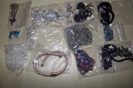 Large collection of unsorted costume jewellery