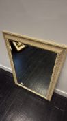 Large gilt-framed rectangular wall mirror