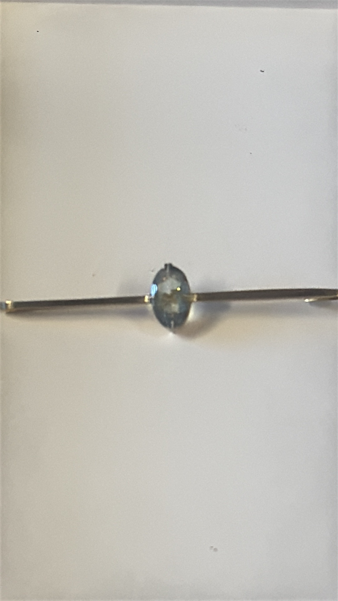 15ct Gold pin brooch set with aquamarine Weight 3.