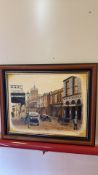 Framed signed oil on canvas street scene with theatre and cinema frontage