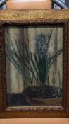 Framed still life oil painting of a potted hyacinth