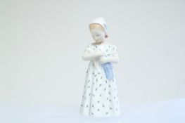 Royal Copenhagen porcelain figure of a girl holding a cloth