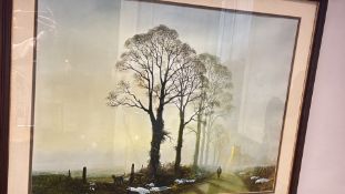 Framed colour landscape print of a misty country scene