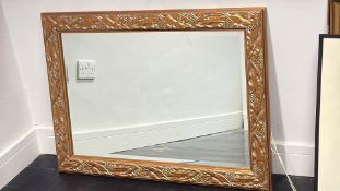 Large carved gilt-framed rectangular wall mirror