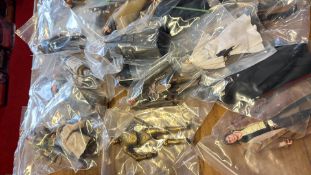 Group of bagged Star Wars action figures and accessories