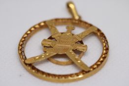 Yellow metal pendant Weight 5g