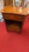 A rectangular mahogany bedside cabinet, with canted corners, a single drawer above an open shelf,