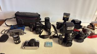 Group of mixed cameras, flashes and lenses to include Nikon, Cannon ect.