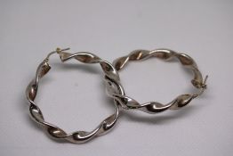 Pair of silver hoop earrings