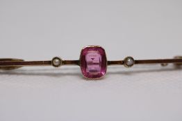 9ct Gold pin brooch set with central pink stone &