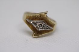 14ct Gold ring set with diamonds set in platinum,