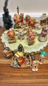 Group of Pendelfin hand-painted stonecraft winter figures and skating scene