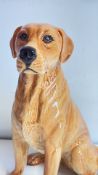 Beswick Glazed ceramic seated dog figure