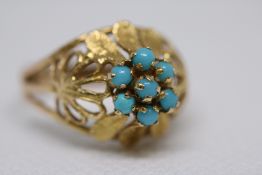 9ct Gold ring set with 7 turquoise stones Weight 4