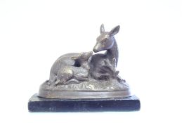 Bronzed deer on base