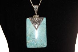 Silver chain with turquoise pendant