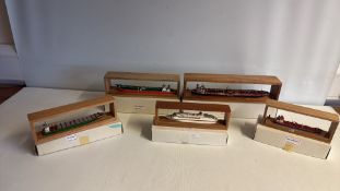 Set of five cased ship models (merchant vessels and cruise liner)