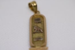 Yellow metal pendant possibly with Egyptian marks