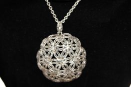 Long white metal chain with silver pendant