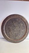 Engraved Asian metal charger with figural scene
