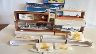 Group of scale ship models and boxed plastic model kits