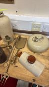Group of brass candlesticks, copper kettle, fire irons and stoneware hot-water bottles