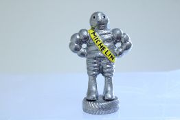 Chrome small Michelin man figure
