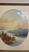 Framed oval watercolour of a mountainous lake landscape, signed (49cm x 41cm including frame)
