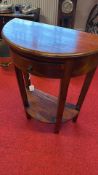 Ancient Mariner demi-lune mahogany hall table