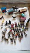 Group of painted lead and plastic toy figures and accessories, comprising assorted street and police